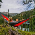 a person chilling in a hammock